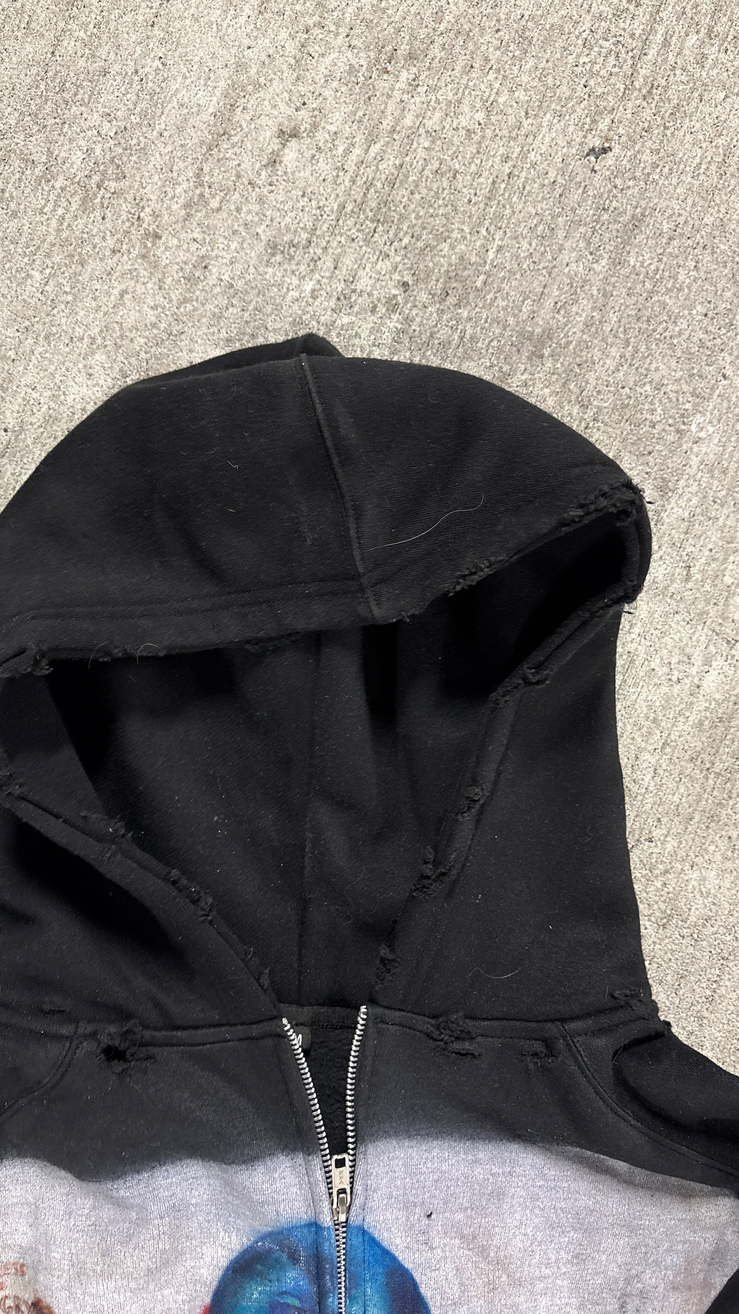 “Life sucks“ black distressed zip up
