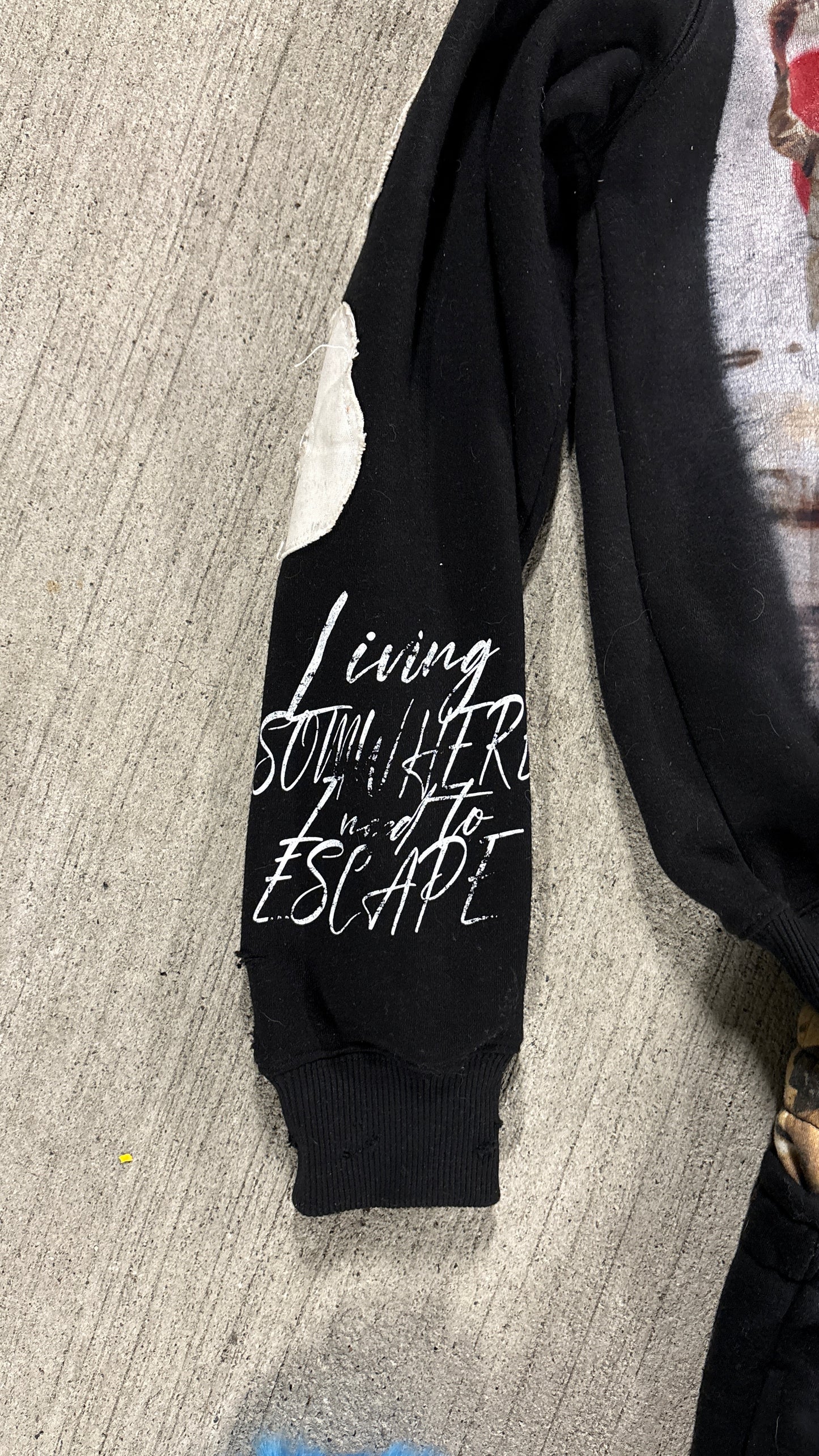 “Life sucks“ black distressed zip up